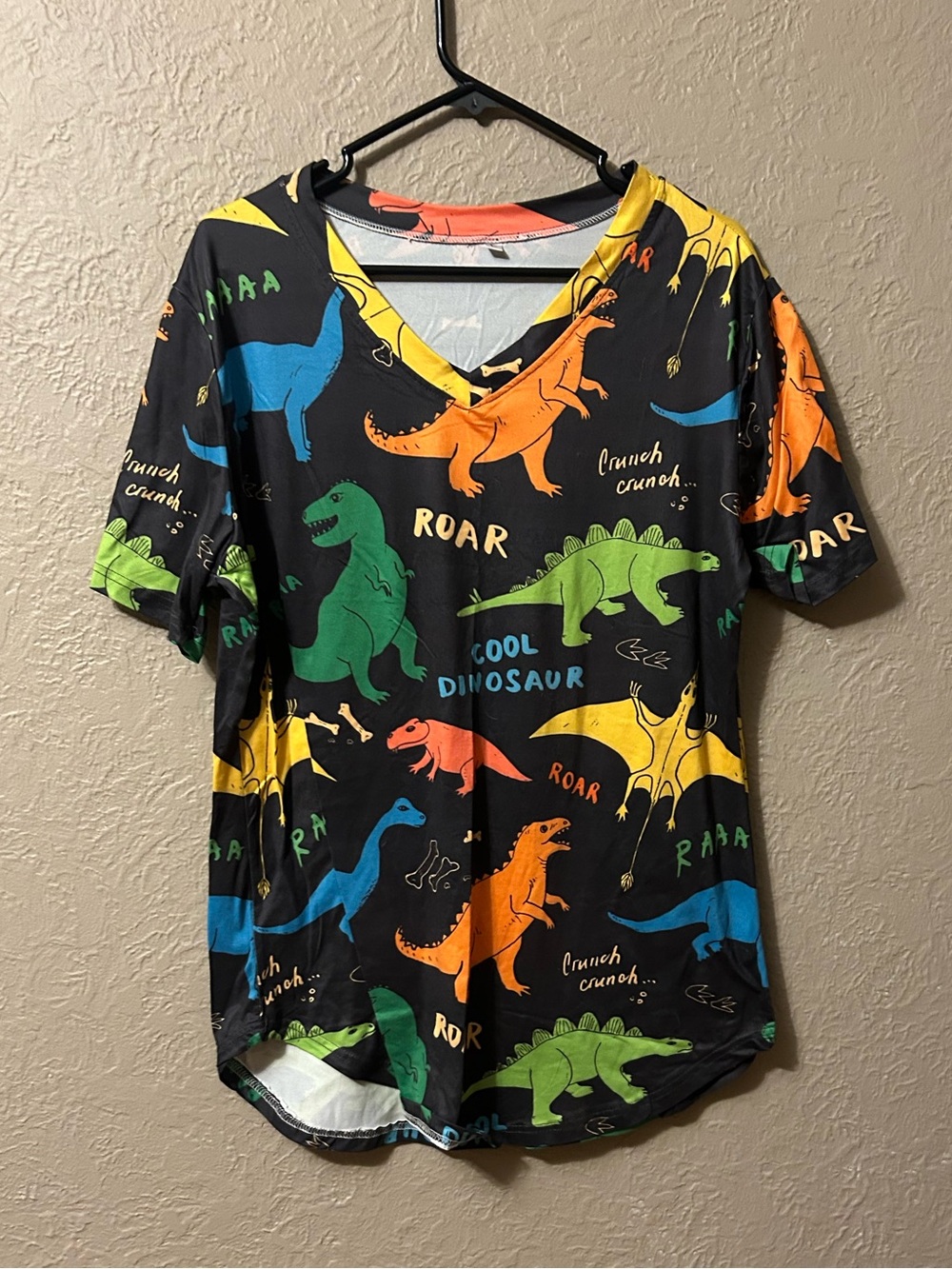 Adult Black Dinosaur V-Neck Tee with Bright Multi-Color Dinosaurs
